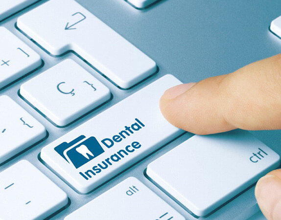 “Dental insurance” button on a computer keyboard